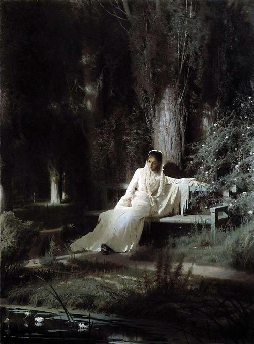 Femme assise sous arbre dans nuit